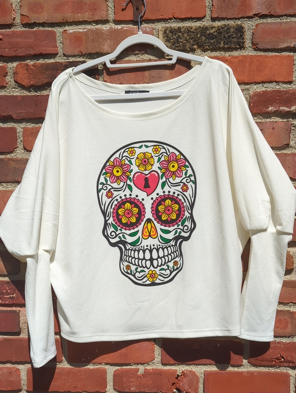 CBR Cream Sweatshirt with Colorful Sugar Skull Graphic